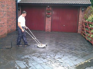 Photo of All Around Property Cleaning Ltd cleaning imprinted concrete with a rotary cleaner